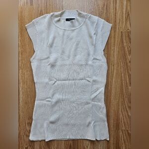 White knit sleeveless mockneck